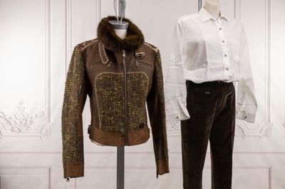 two mannequins that are standing next to each other