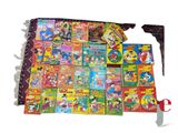 une pile de livres pour enfants et une paire de ciseaux