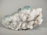a large piece of rock with a lot of crystals on it
