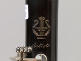 a close up of a bottle of wine on a table