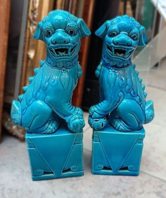 CHINE (XXè) Paire de chiens de fô en faïence bleue. - Photo 1