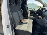 a white van with black seats in the back of it