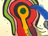 a drawing of a colorful object on a piece of paper