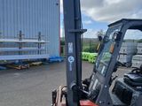 a forklift that is parked in a parking lot
