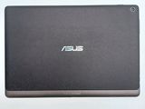 the back of a laptop with the asus logo on it