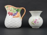 two vases that are sitting next to each other