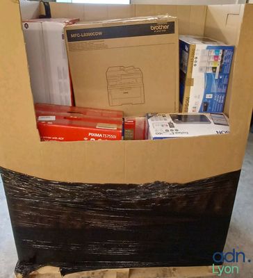 a cardboard box that has a bunch of items in it
