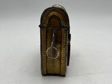 an image of a small wooden box with a key in it
