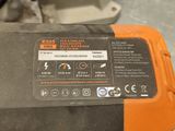 a close up of an orange and black battery box