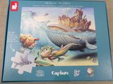 puzzle box with a picture of a mermaid, a whale, and a castle