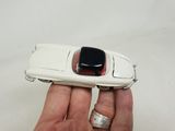 a person holding a cell phone in their hand