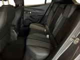 the back seats of a car are empty and the passenger seat is empty
