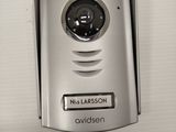 a close up of a video camera mounted on a wall