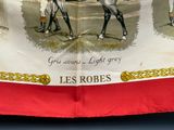 une photo d'une banderole sur laquelle figurent deux hommes à cheval