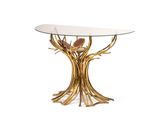 une table en feuille d'or avec un plateau en verre sur fond blanc
