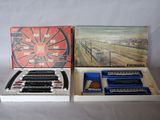 a box with a train set in it on a table