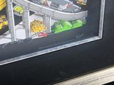 a picture of a picture of a bus and a bus stop
