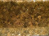 a picture of a piece of art made out of gears