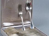 silverware in a silver case with spoons, forks and spoons