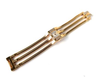 gold plated metal hair clip with a diamond clasp