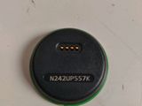 an image of a close up of a battery on a white surface