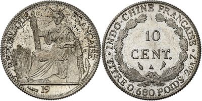 a silver coin with the image of a woman on it