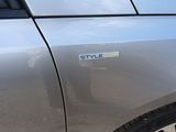 a close up of a car door with a sticker on it