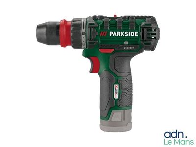 a close up of a cordless drill with a battery attached