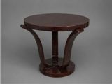 a round table with a wooden base and a wooden top