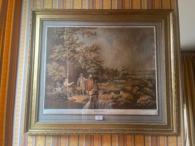 une photo d'un tableau accroché au mur
