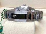 an image of a rolex watch on display in a box