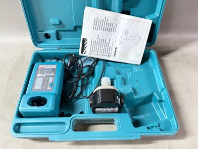 a blue tool case with a power supply inside of it