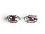 pair of ruby and diamond earrings
