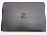 a black laptop with a hp logo on it
