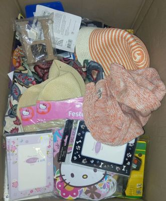 a cardboard box filled with assorted items and items