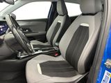 the interior of a blue car with black and gray seats