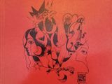 a red book with a drawing of two people on it