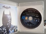 a batman arkhamn game in a clear case