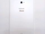 the back of a white samsung phone with a sticker on it