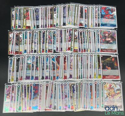 a large pile of cards that are on a table