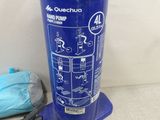 a blue fire extinguisor sitting on a table