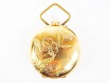 une image représentant un cadenas doré orné d'un motif floral