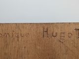 an image of a close up of a piece of wood with writing on it