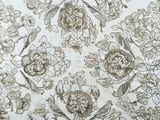 a drawing of a bird and flowers on a sheet of paper