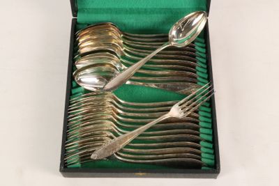 a lot of silver spoons and forks in a box