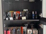 a cabinet that has many different types of cameras in it