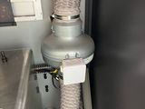 an image of a machine with a hose attached to it ' s side