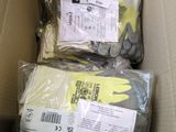 boxes of gloves and gloves in a cardboard box with labels on them