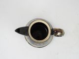 a coffee cup that is sitting on a saucer