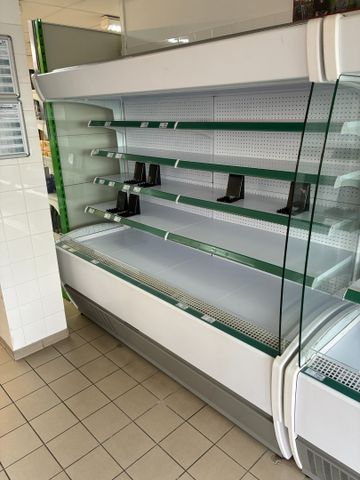 Vitrine réfrigérée service avant avec groupe déporté. L (environ)...